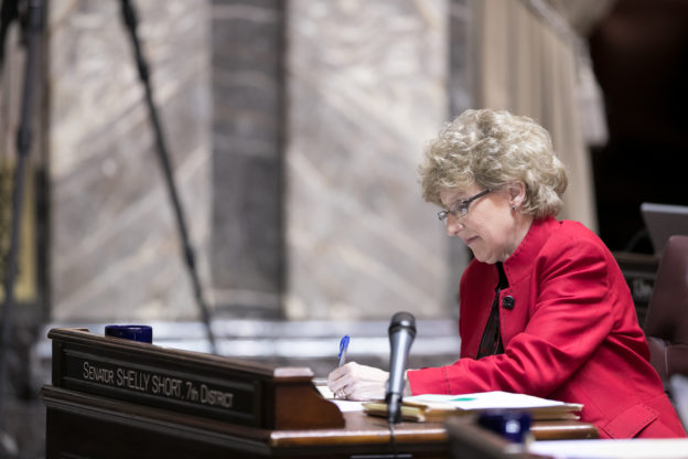 Sen. Short working at her floor desk.